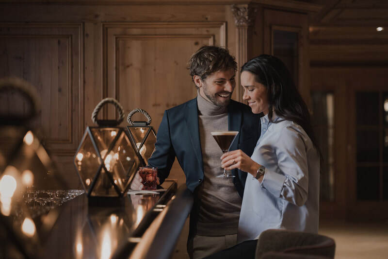 Picture couple drinking cocktails in Schlosshotel Fish